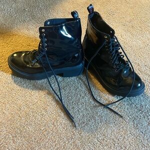 Black shiny combat boots